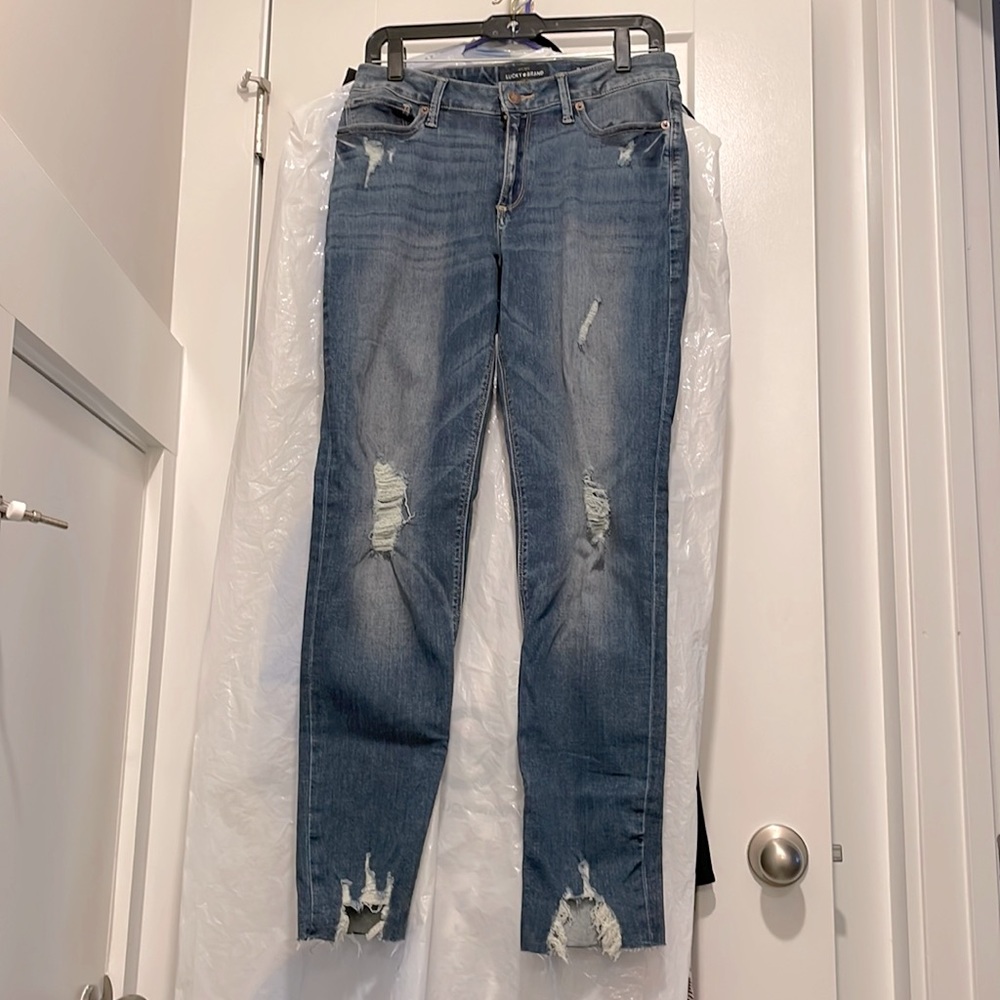 Pre-Loved Lucky Brand jeans size 10. Distressed styling. Flawless, worn once.
